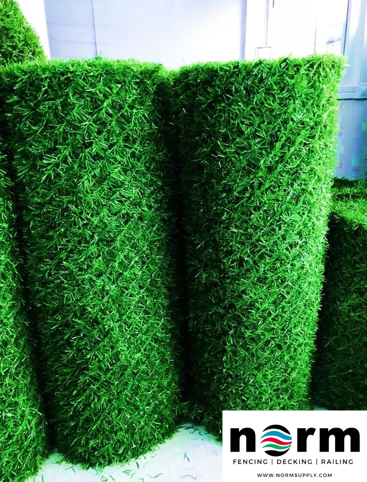 Durable grass fence rolls available in 3 ft and 4 ft sizes for privacy fences in Georgia