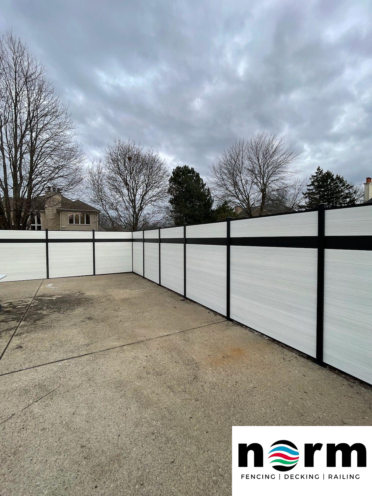 Eco-friendly WPC fence panel in teak color under Georgia sun