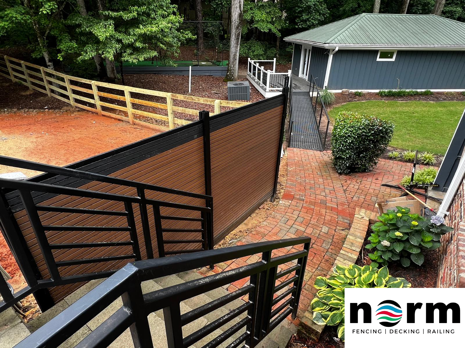 Side-by-side comparison of WPC fence and traditional wood fence