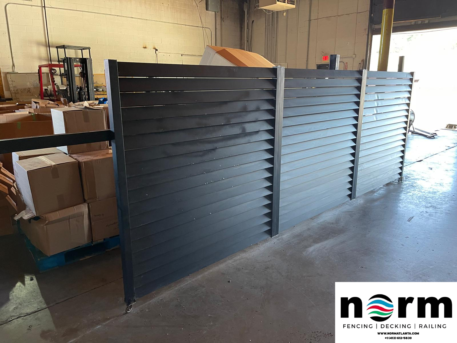 Aluminum frame sliding gate with wood-textured panels