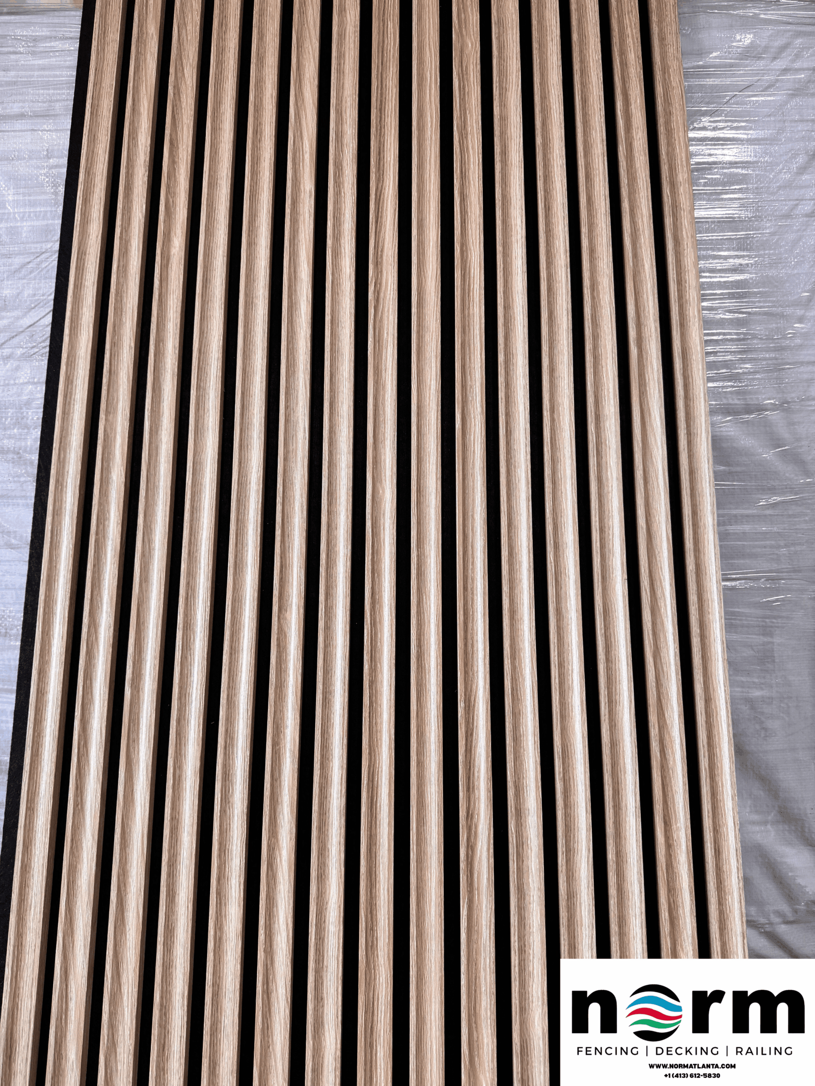 Detailed texture of acoustic wall panel with wood grain