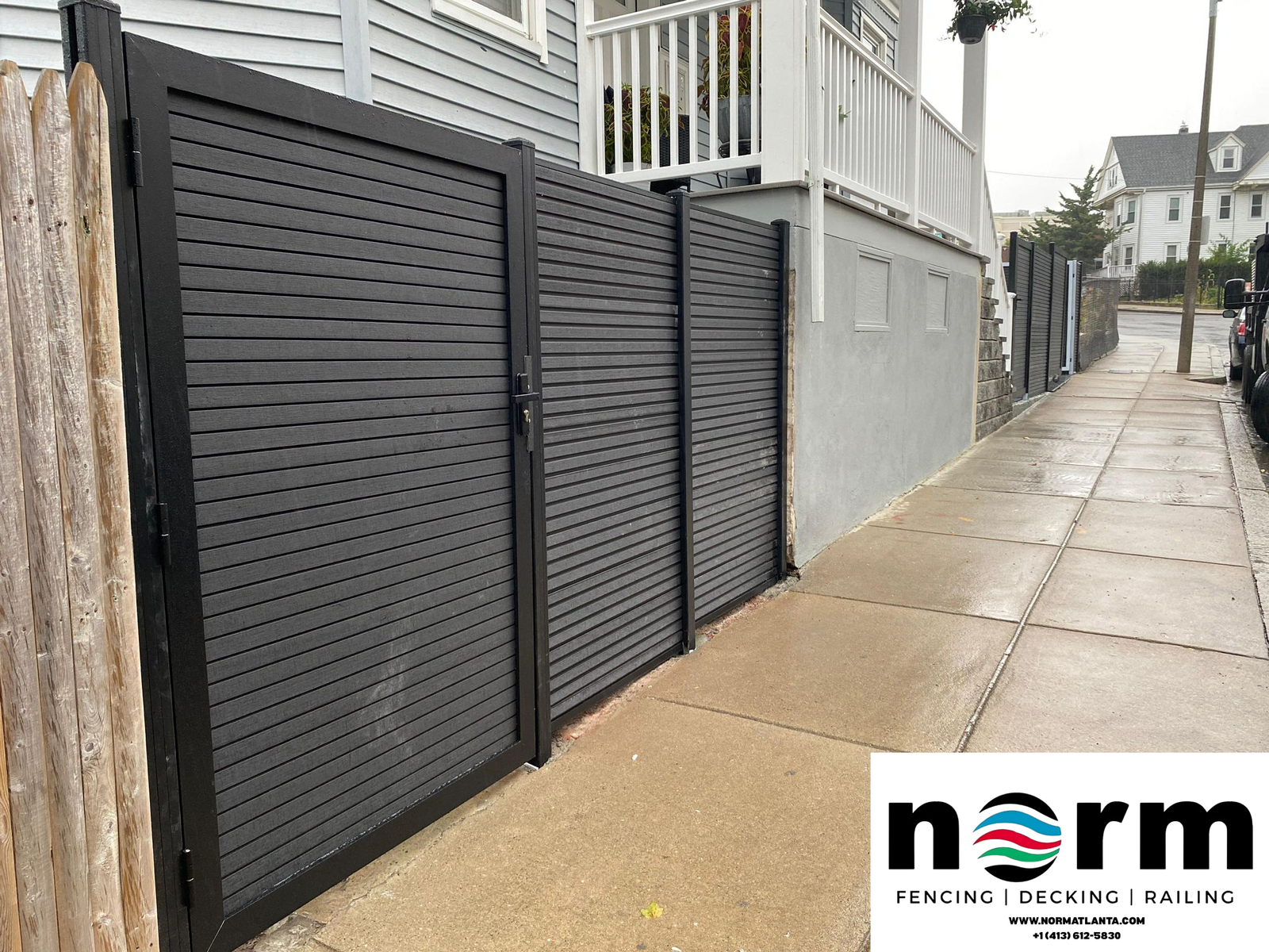 Modern sliding gate at residential entrance in Georgia