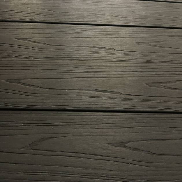 black composite deck board 12ft norm atlanta black deck board composite wood grain outdoor black composite decking plank modern black deck board close up black composite deck surface texture