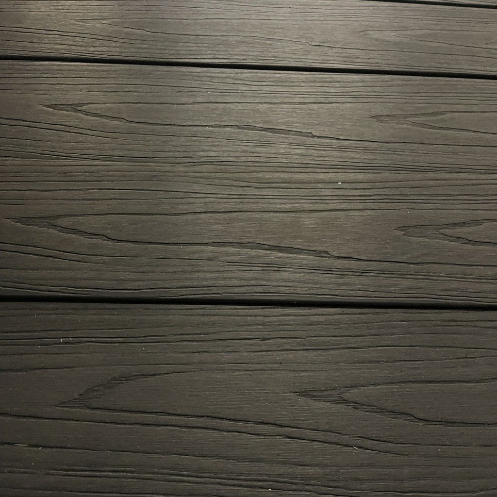 black composite deck board 12ft norm atlanta black deck board composite wood grain outdoor black composite decking plank modern black deck board close up black composite deck surface texture
